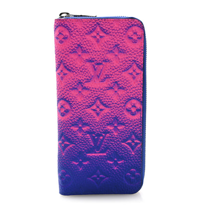 Louis Vuitton Taurillon Illusion Zippy Vertical Wallet Bleu Rose 1 of 7
