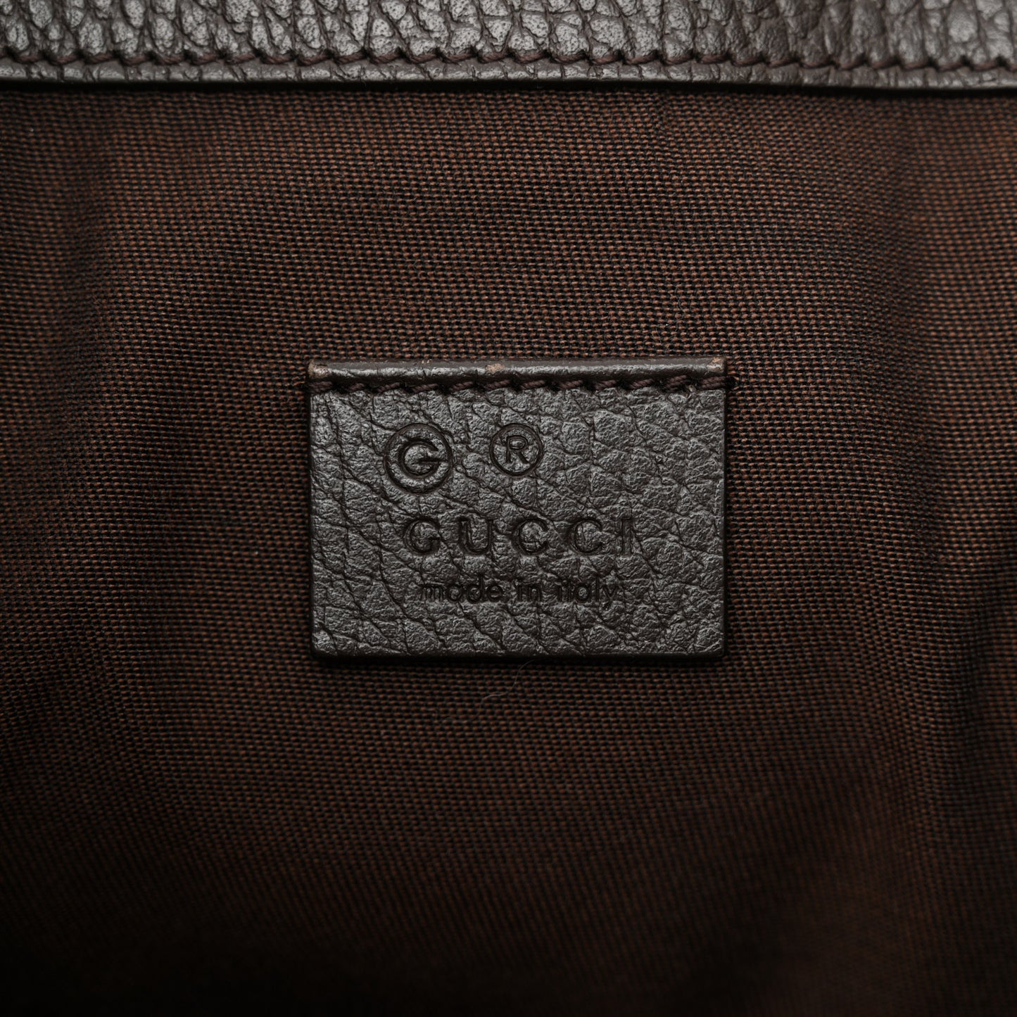 Monogram Dollar Calfskin O Drawstring Backpack Beige Ebony Testa di Moro Dark Chocolate