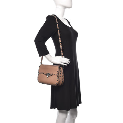 Valentino Garavani Pebbled Calfskin Medium Rockstud Rolling Flap Saddle Bag Soft Noisette 2 of 14