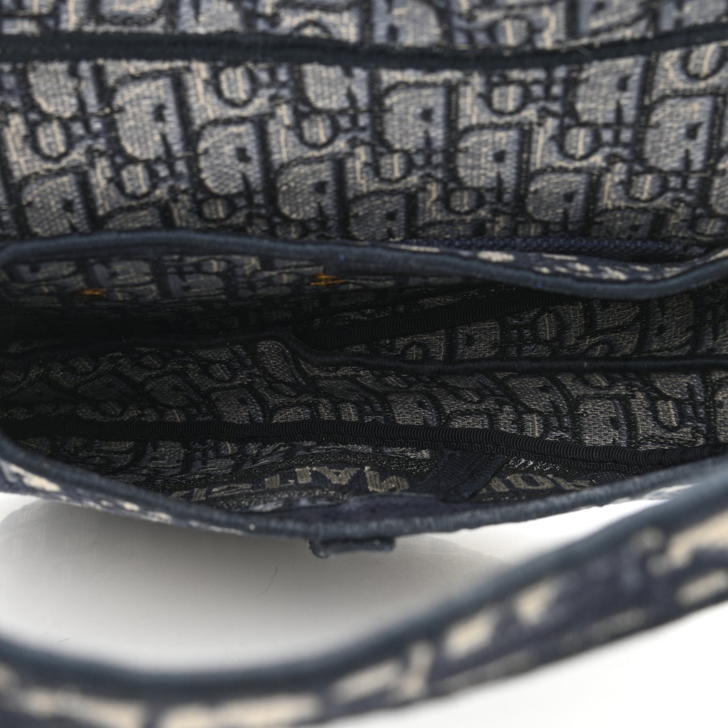 Oblique Embroidered Saddle Bag Blue
