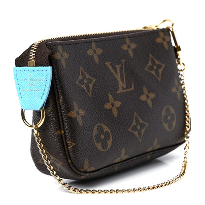 Louis Vuitton Monogram 2022 Christmas Animation Tokyo Mini Pochette Accessories Blue 2 of 12