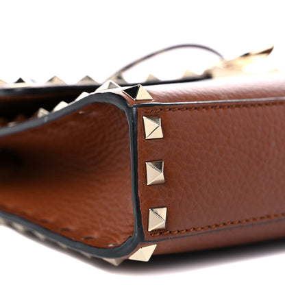 Valentino Garavani Pebbled Calfskin Medium Rockstud Flip Lock Crossbody Bag Saddle Brown 5 of 18