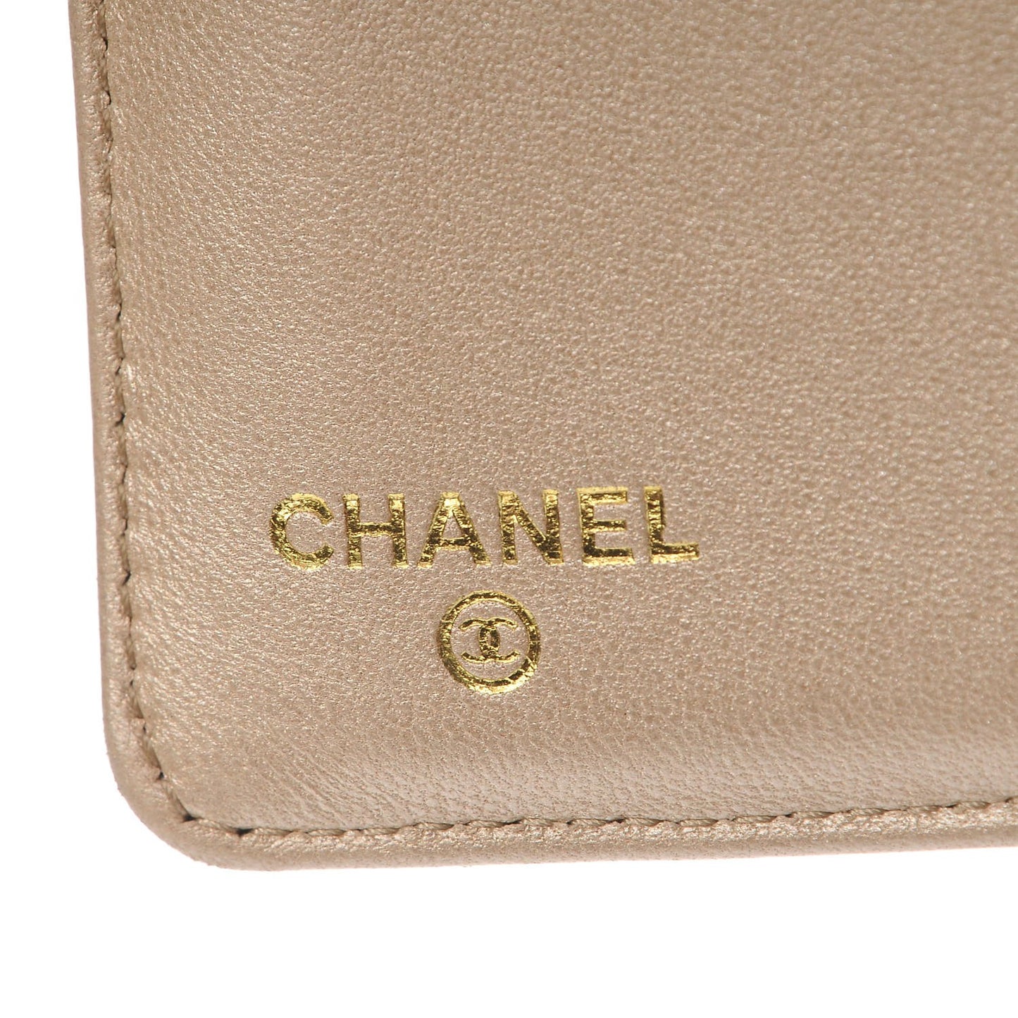 Lambskin Camellia Embossed Yen Wallet Fuchsia