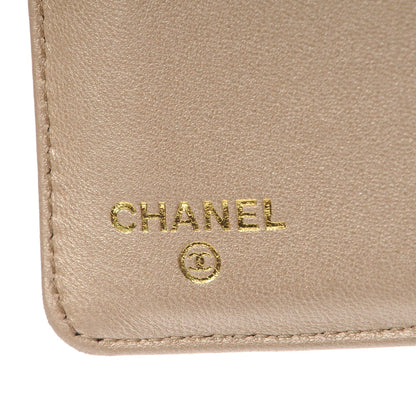 Chanel Lambskin Camellia Embossed Yen Wallet Fuchsia 6 of 9