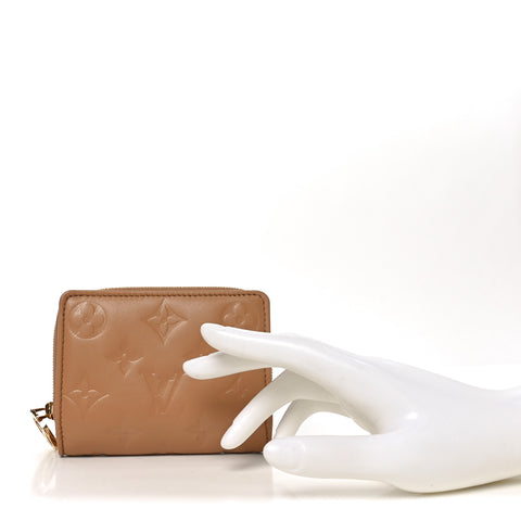 Lambskin Embossed Monogram Lou Coussin Wallet Camel