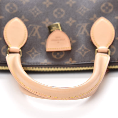 Louis Vuitton Monogram Rivoli MM 9 of 10