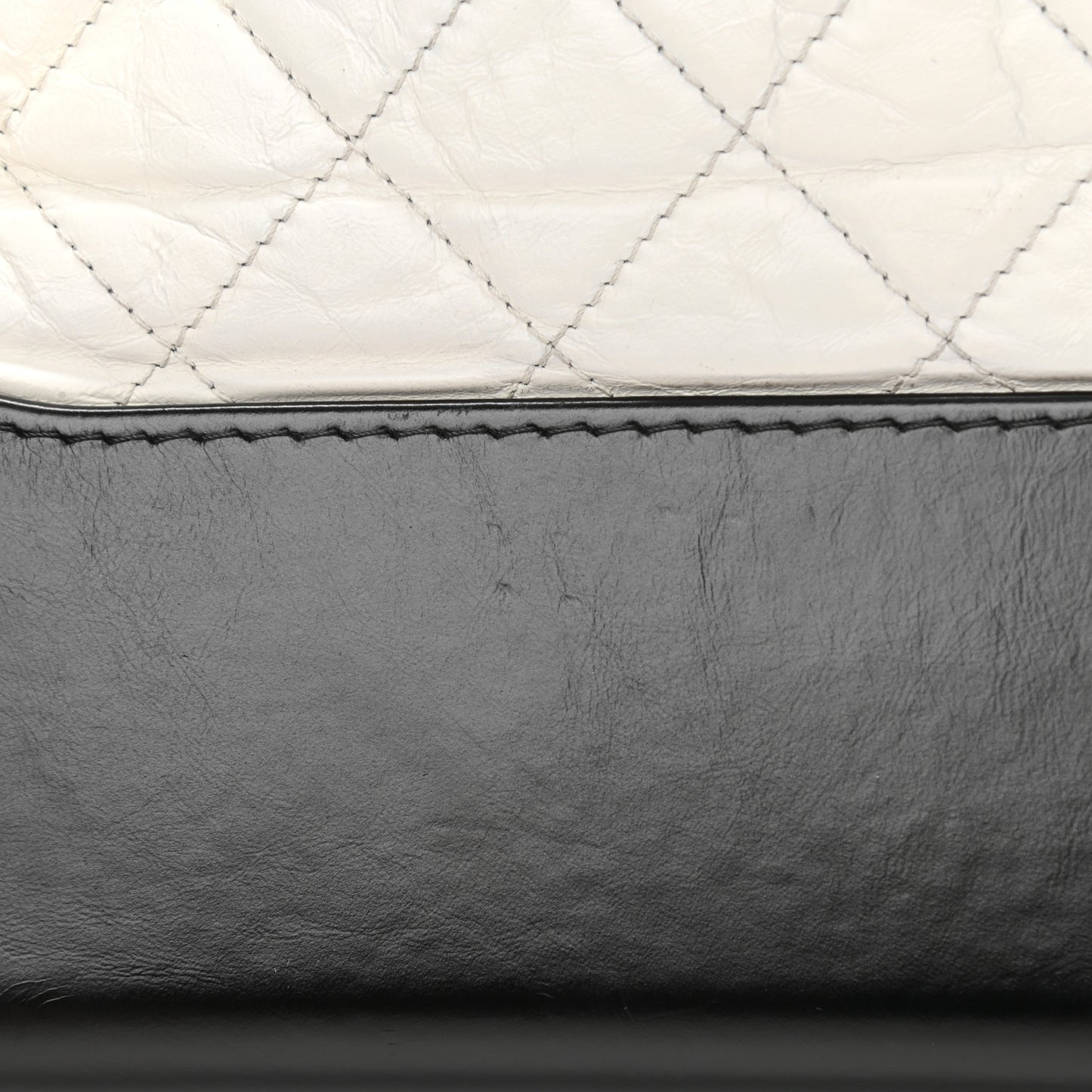 Aged Calfskin Quilted Medium Gabrielle Hobo Black White