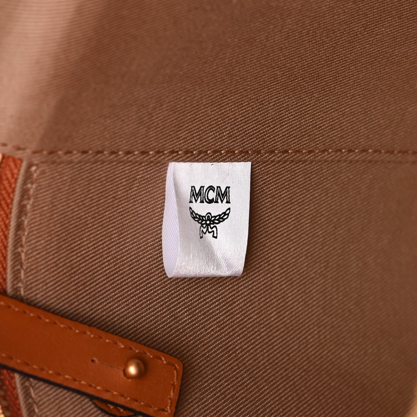 Calfskin Embossed Monogram Cylinder Crossbody Bag Cognac