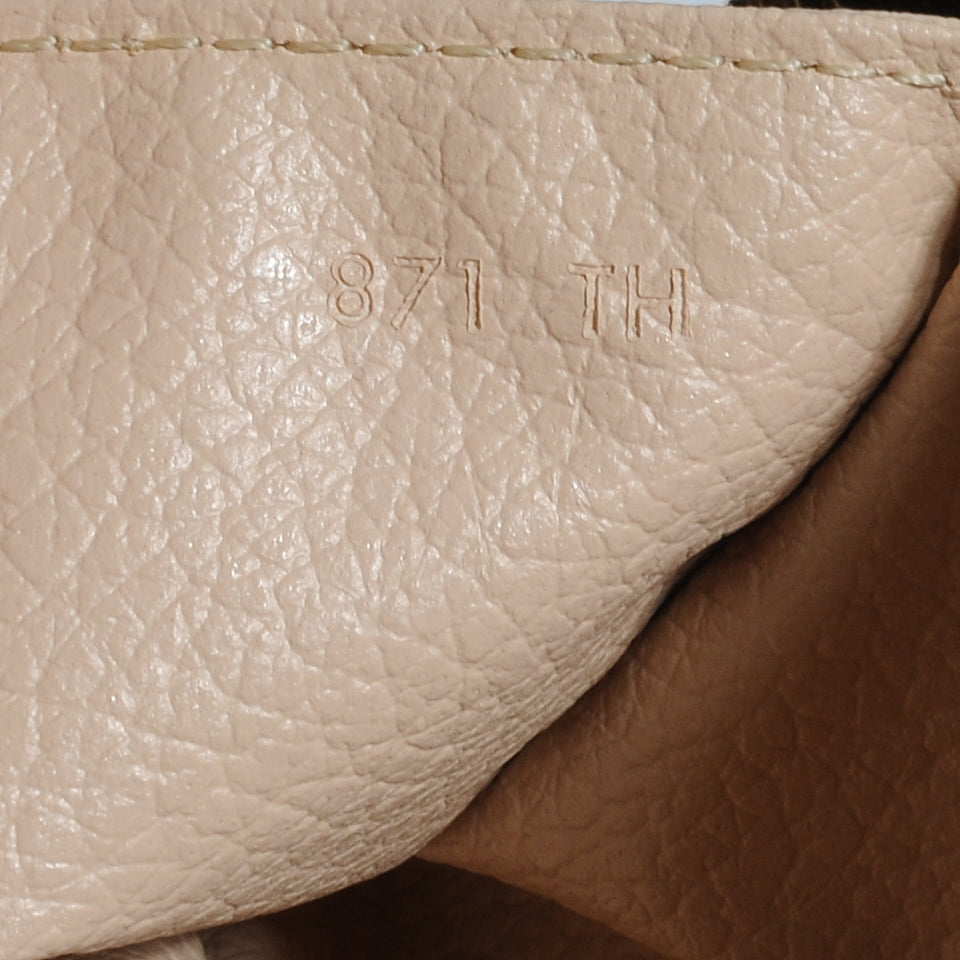 Monogram Trousse Toilette 23