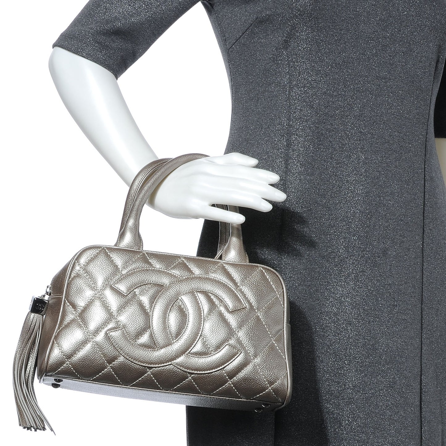 Caviar Quilted Small Bowler w Tassel Silver