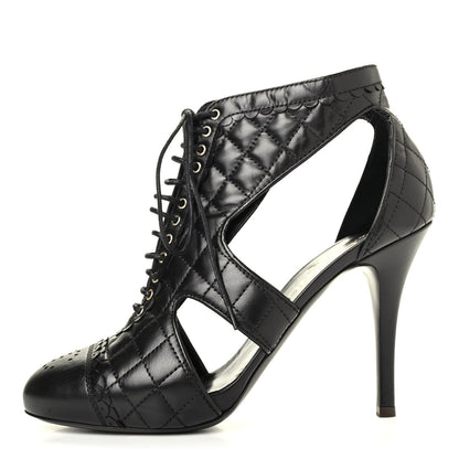 Chanel Calfskin Quilted Cut Out Boots 39 Black 1 of 4