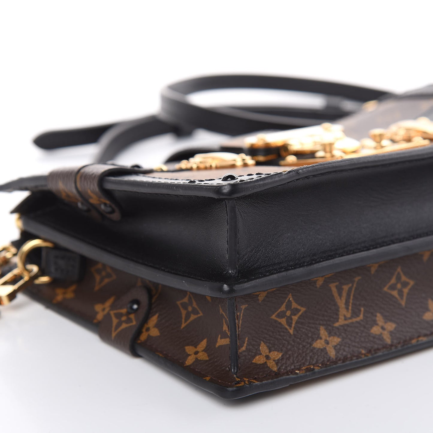 Reverse Monogram Trunk Clutch