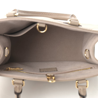 Louis Vuitton Empreinte Monogram Giant Onthego PM Tourterelle Creme 5 of 8