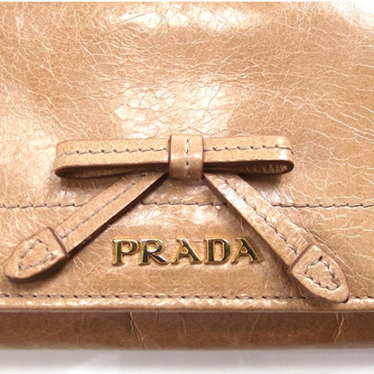 Prada Vitello Bow Flap Wallet 8 of 8