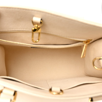 Louis Vuitton Empreinte Monogram Giant Onthego PM Cream Beige 5 of 9