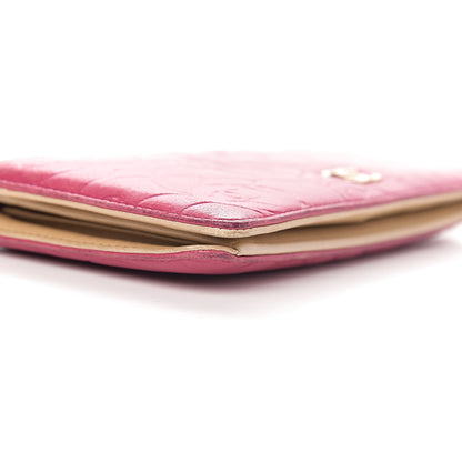 Chanel Lambskin Camellia Embossed Yen Wallet Fuchsia 12 of 13