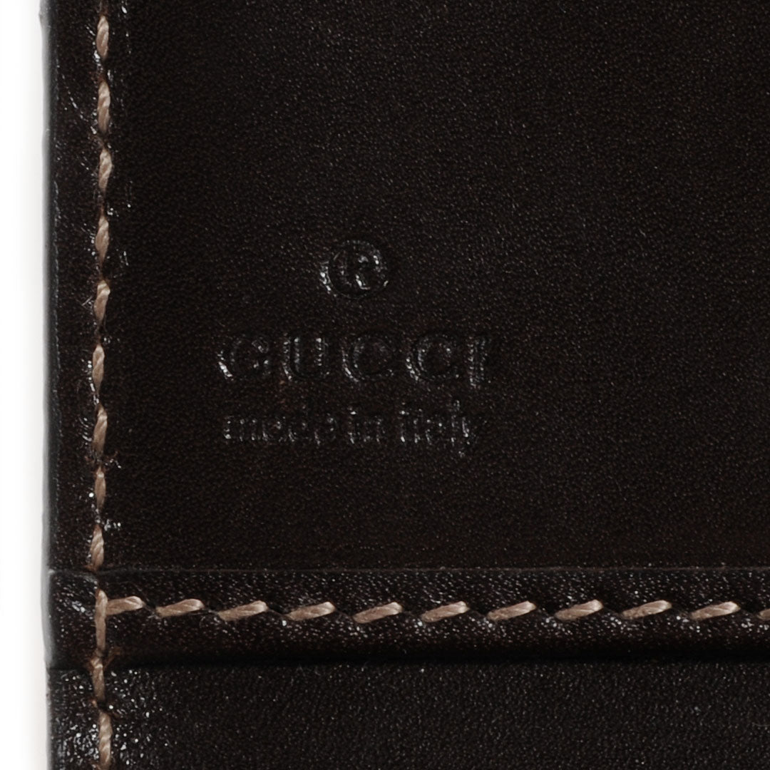 Patent Monogram Continental Wallet Brown