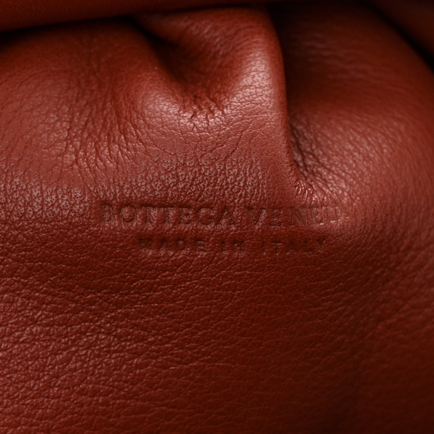 Butter Calfskin The Mini Pouch Rust