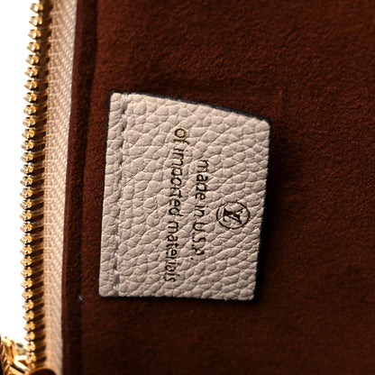 Louis Vuitton Empreinte Neo Alma PM Creme 7 of 10
