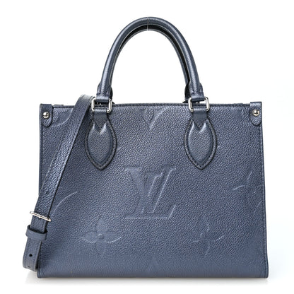Louis Vuitton Metallic  Empreinte Monogram Giant Onthego PM Navy Nacre 1 of 9