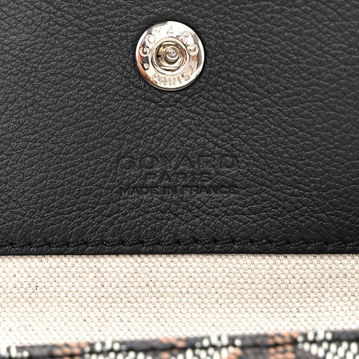 Close up image of an authentic Goyard brand logo inside a Saint Louis Tote in Black by FASHIONPHILE