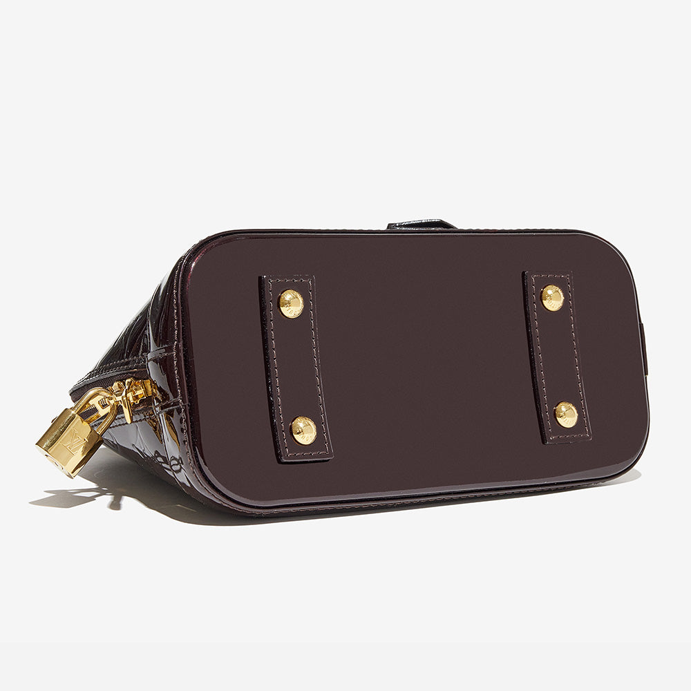 this is an image by FASHIONPHILE of an authentic vernis louis vuitton alma bb bag