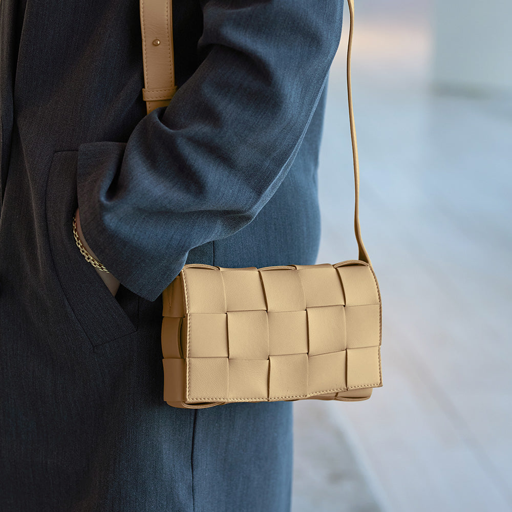 the small cassette from bottega veneta worn as a shoulder bag by FASHIONPHILE