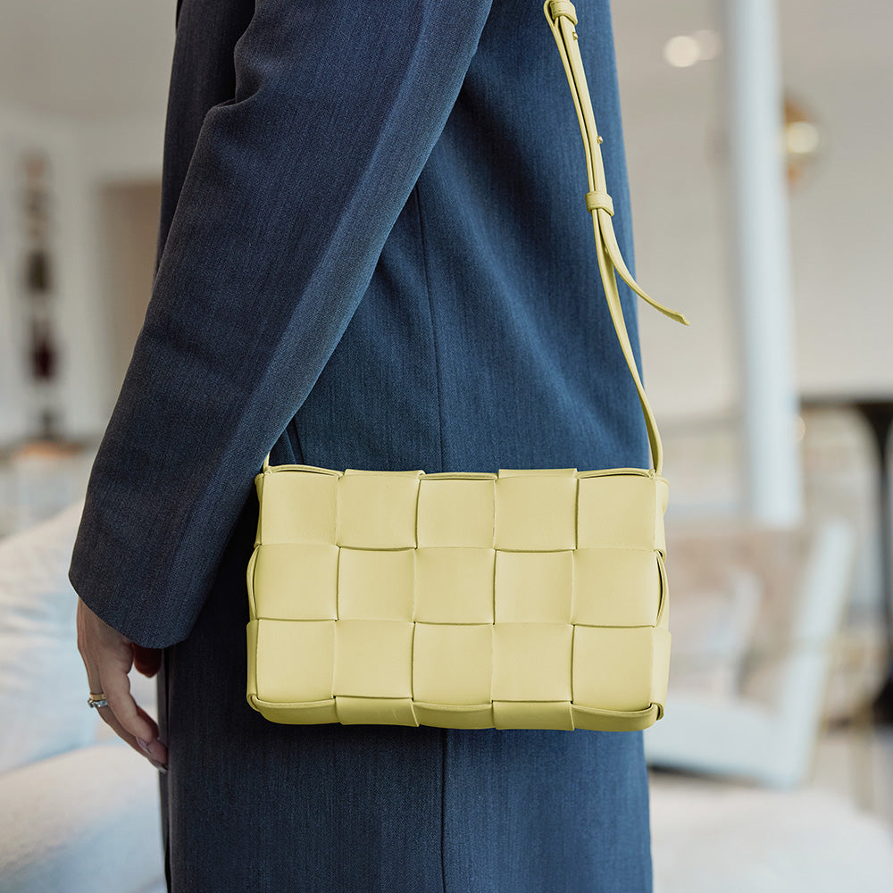 the cassette from bottega veneta worn as a shoulder bag by FASHIONPHILE