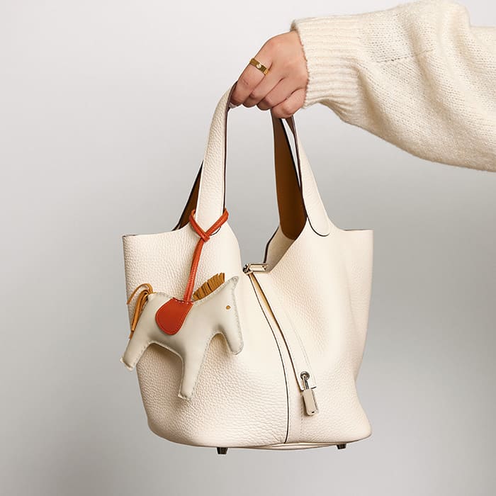 studio image of hermes picotin bag with hermes rodeo charm FASHIONPHILE