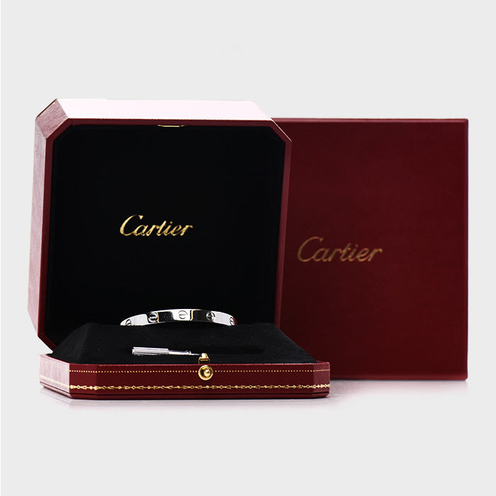 studio image of cartier love bracelet in box FASHIONPHILE