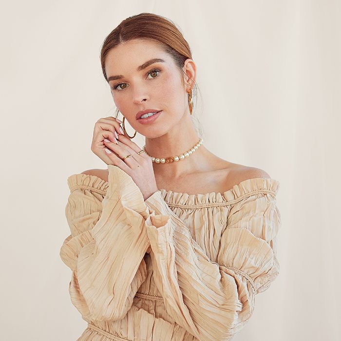 model wearing pearls FASHIONPHILE