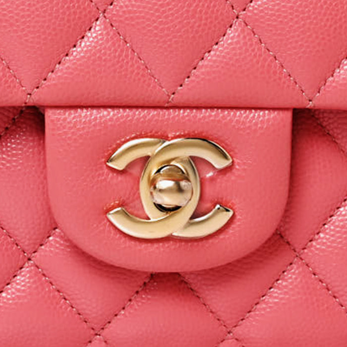 close up image of chanel CC hardware in gold FASHIONPHILE