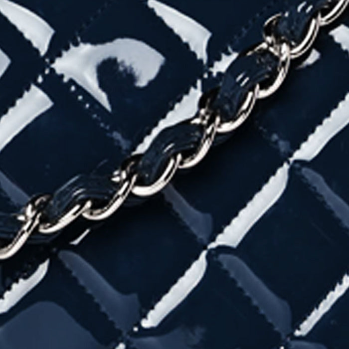 close up image of Chanel patent leather FASHIONPHILE