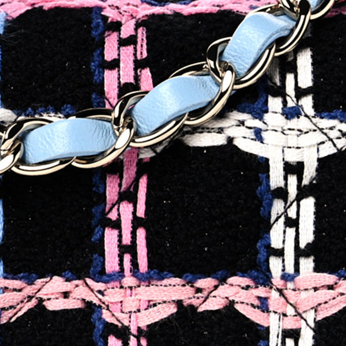 close up image of chanel tweed FASHIONPHILE