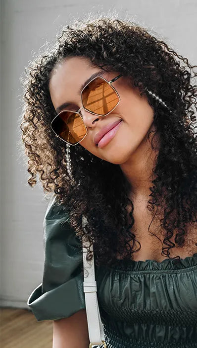 Lifestyle image of model in her designer sunglasses FASHIONPHILE