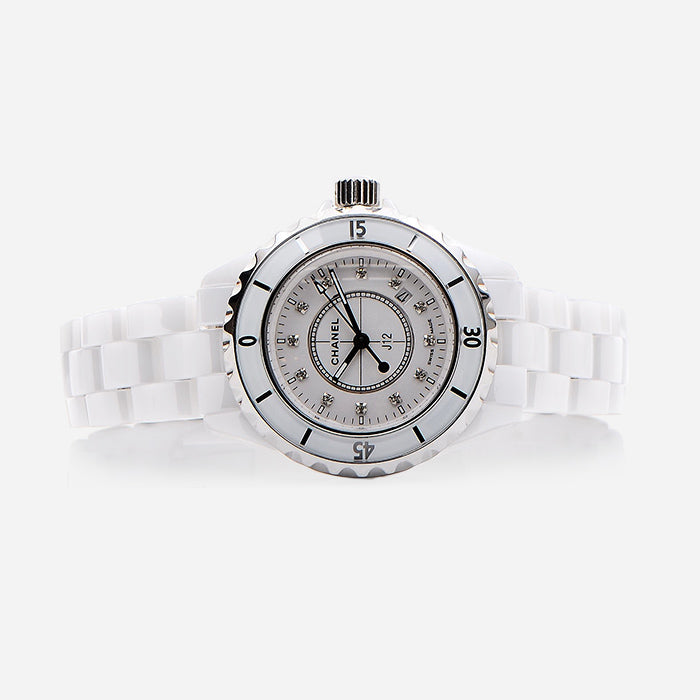 studio image of fake Chanel J12 watch FASHIONPHILE