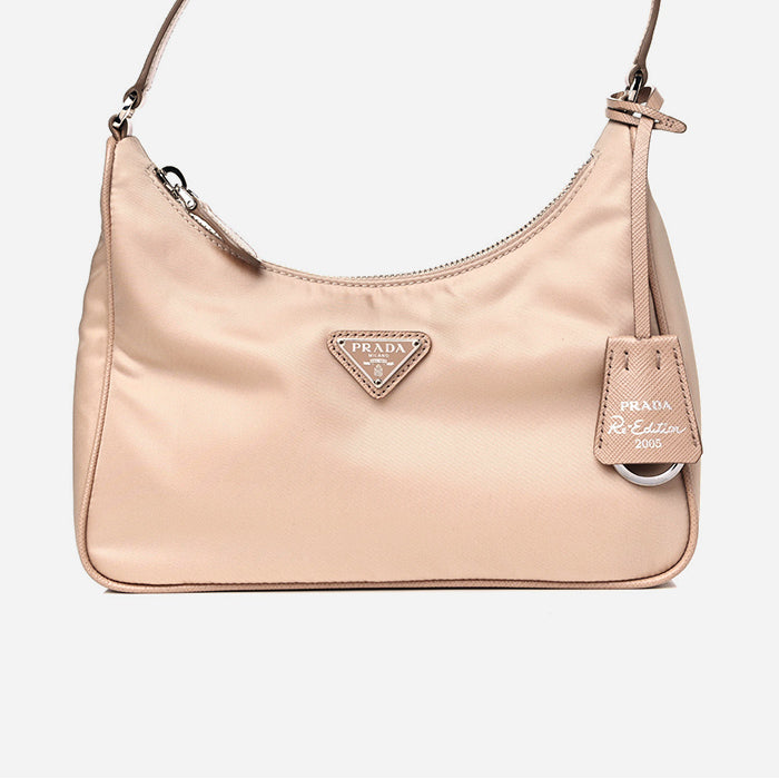 studio image of prada re-nylon mini re-edition bag FASHIONPHILE