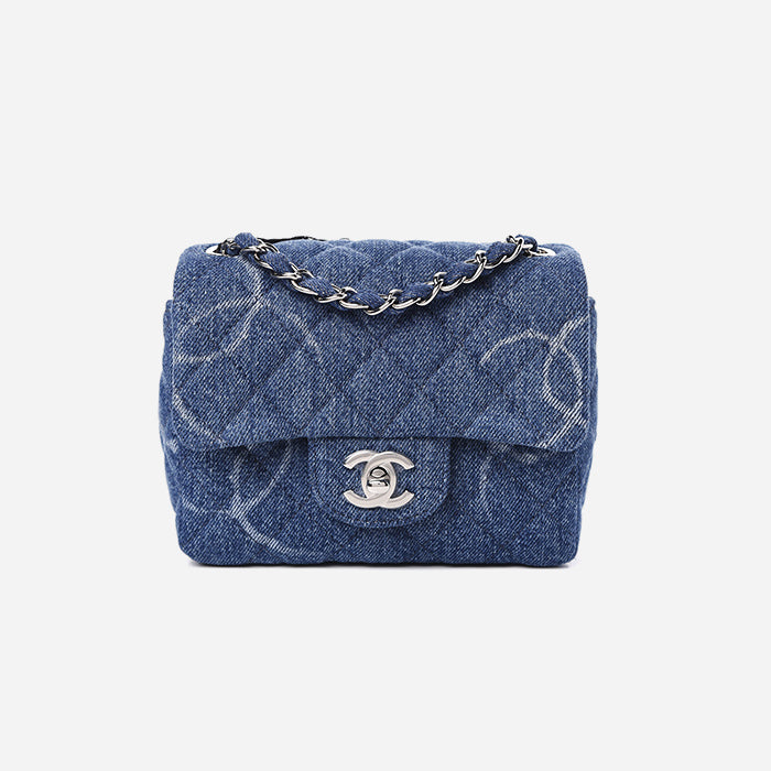 studio image on white of blue denim Chanel mini square flap FASHIONPHILE