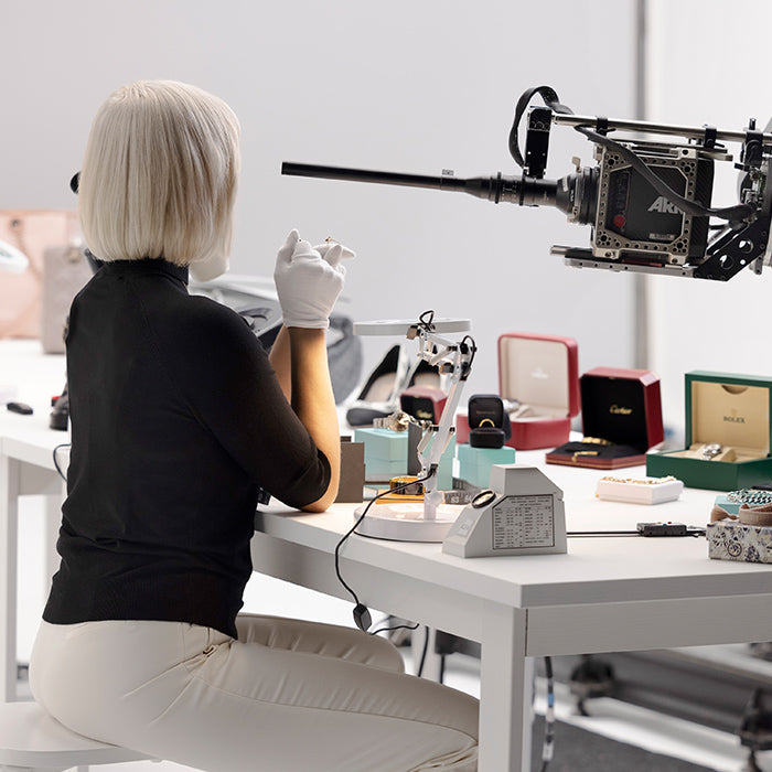 behind the scenes on set for FASHIONPHILE about us commercial authentication station