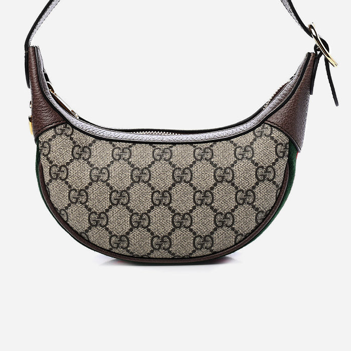studio image of gucci gg supreme monogram ophidia half moon hobo FASHIONPHILE