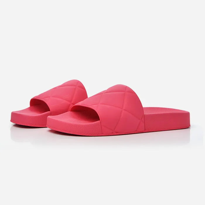 Studio image of Bottega Veneta Rubber slider sandals in pink at Fashionphile