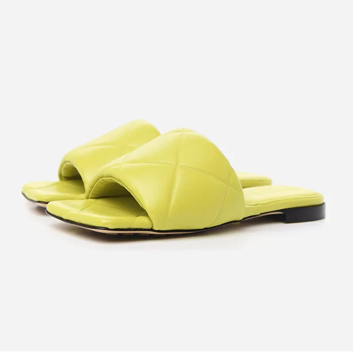 Studio image of bottega veneta lido flat sandal in Kiwi at Fashionphile