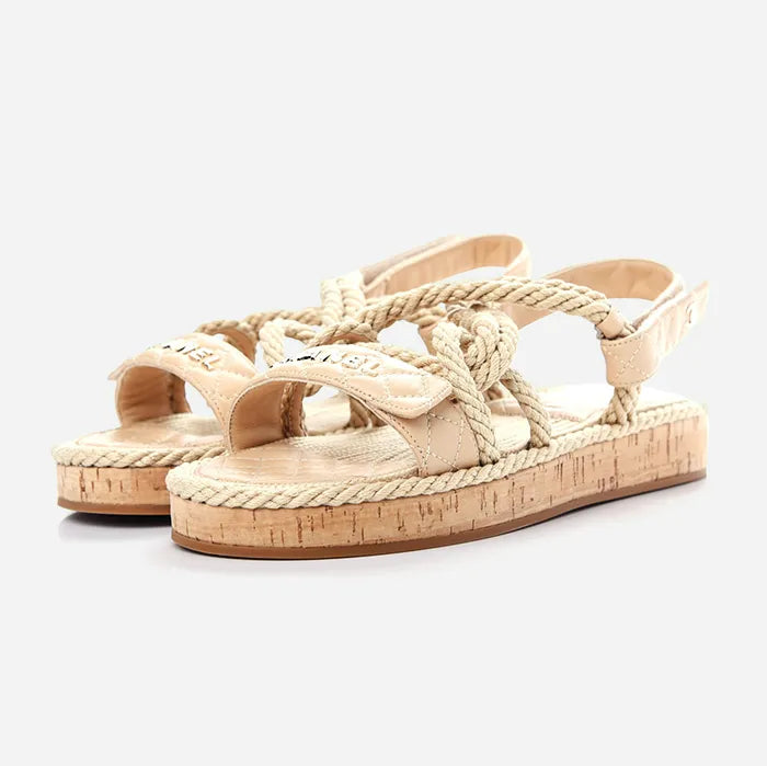 studio image of chanel cord lambskin quilted logo sandals at fashionphile