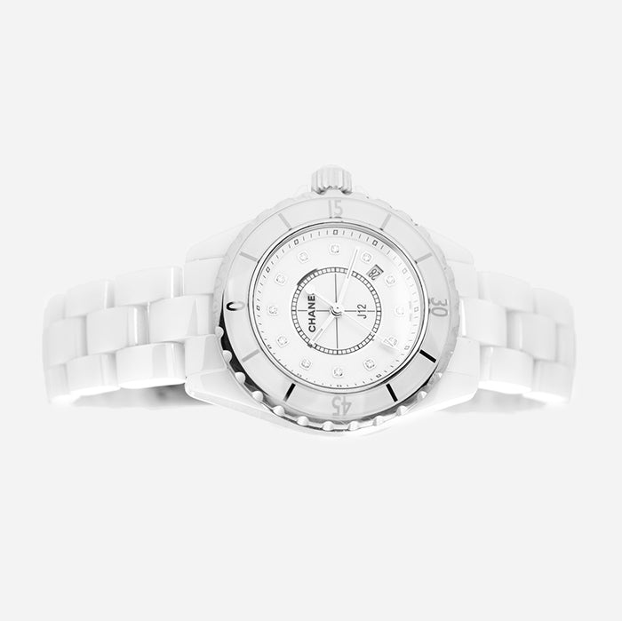 studio image of authentic Chanel J12 watch FASHIONPHILE
