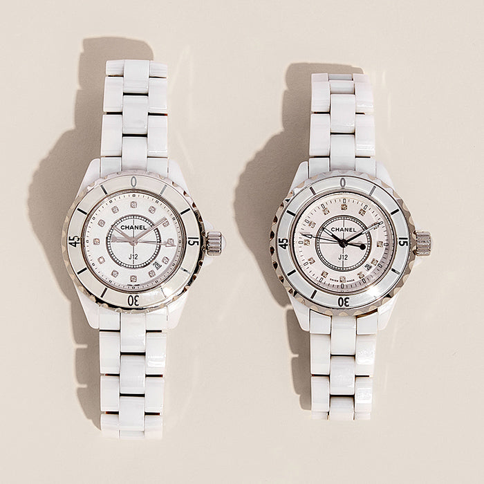 studio image of white authentic and fake Chanel J12 watch FASHIONPHILE