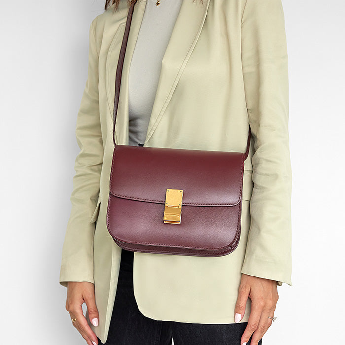 this is the medium celine classic box bag worn as a crossbody by fashionphile