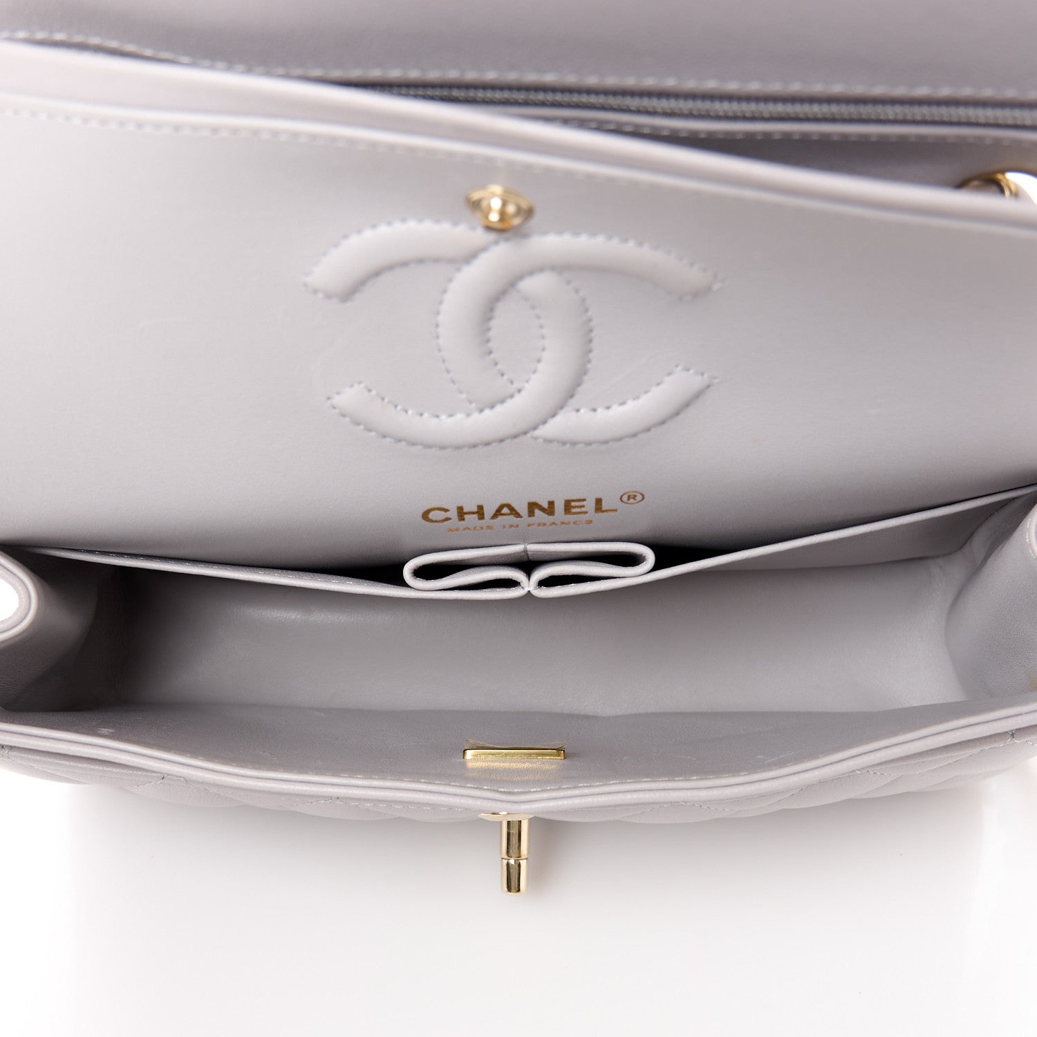A view of the inside of a Chanel Lambskin Quilted Small Double Flap Light Grey