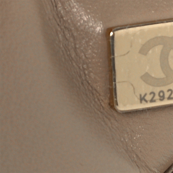 close up image of chanel microchip inside bag FASHIONPHILE