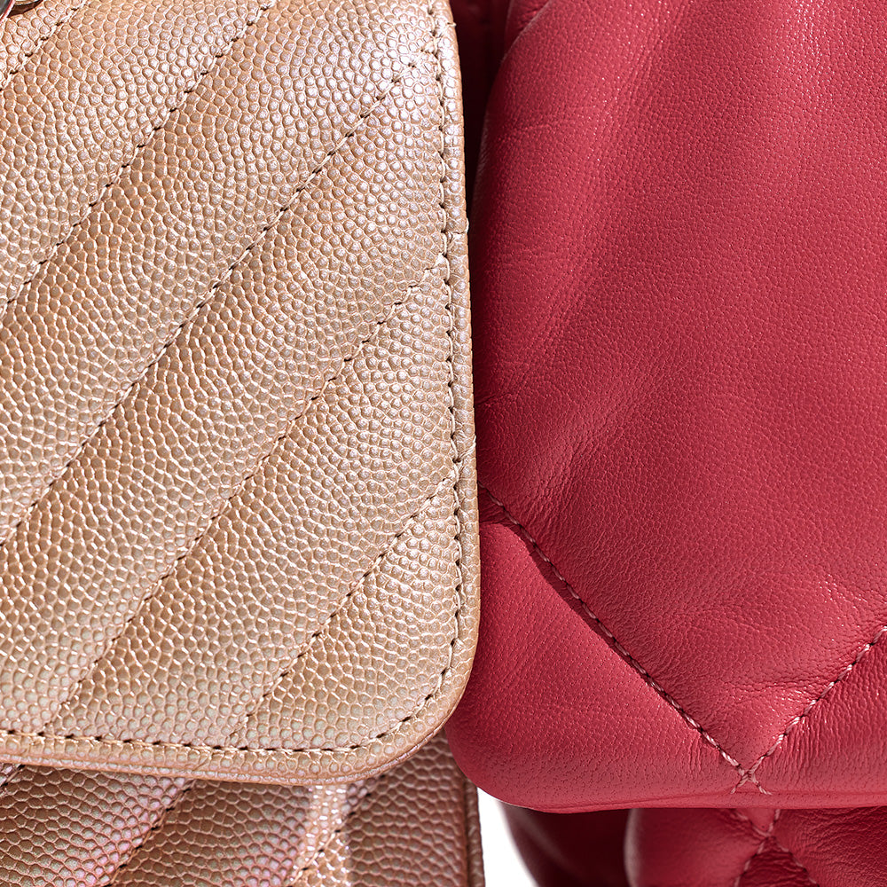 close up image of two chanel bags that compares chanel caviar leather with chanel goatskin leather by FASHIONPHILE
