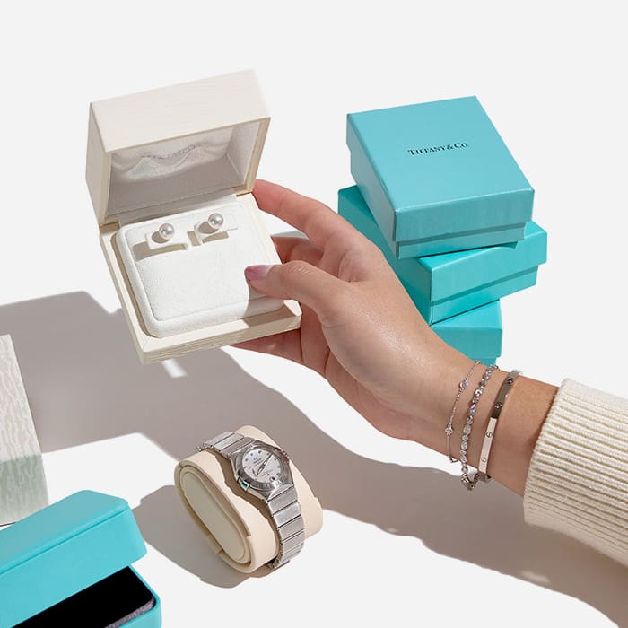 pre-owned ultra-luxury earrings, bracelets, and watches that come with the original box by FASHIONPHILE
